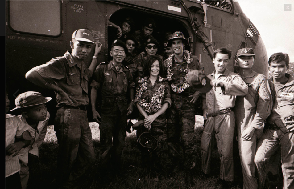   Sean Flynn, centre right, during the Vietnam war  
